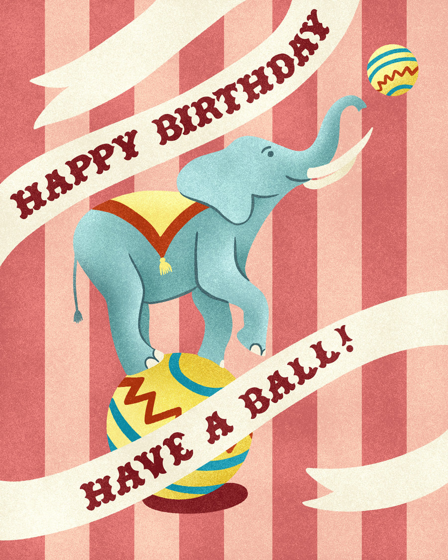 Birthday card with an elephant performing a trick on balls against a striped background