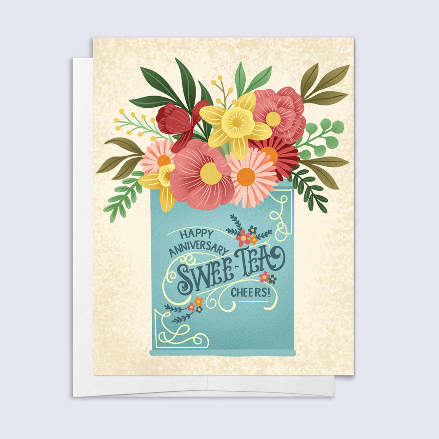 Greeting card with floral design and 'Happy Anniversary Swee-Tea Cheers!' text on a light blue background.