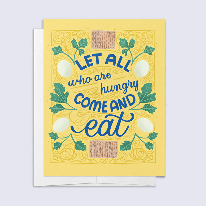 Yellow card with blue text 'Let all who are hungry come and eat' featuring illustrations of matza, boiled eggs, and parsley 