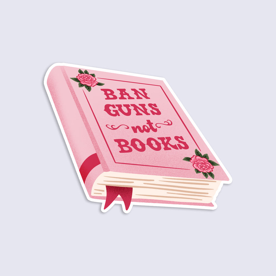 Sticker with a Pink book with 'Ban Guns not Books' text on a light gray background