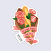 Sticker with bread and roses design with text "we want bread and roses too"