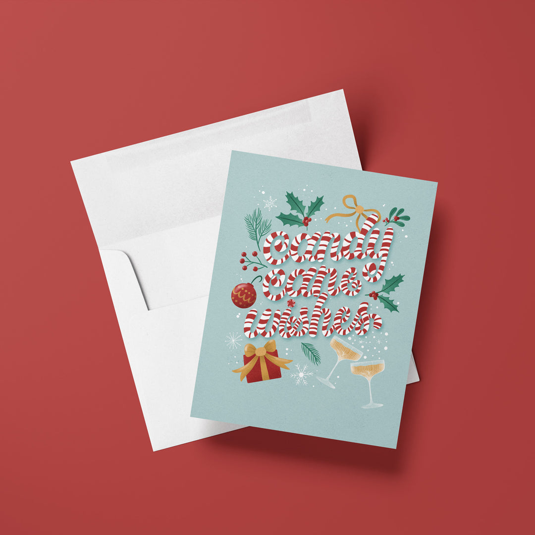 Christmas-themed greeting card with candy cane design on a red background