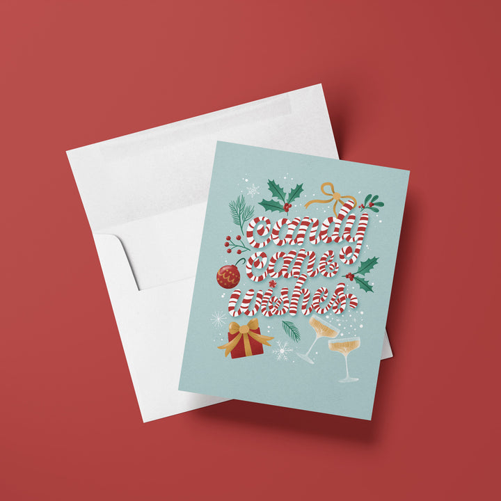 Christmas-themed greeting card with candy cane design on a red background