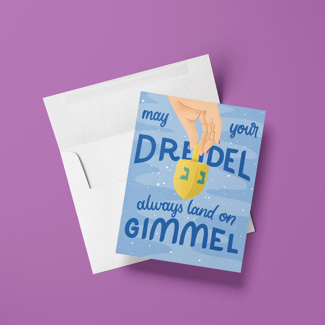 Greeting card with a dreidel illustration and text on a purple background