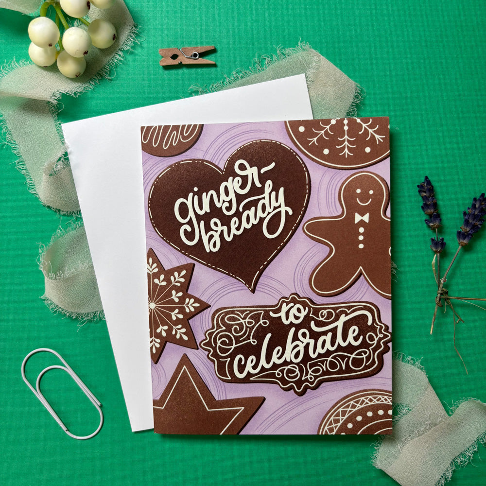 Greeting card with gingerbread design on a green background