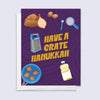 Hanukkah card with illustrated potato latke ingredients and text "have a grate hanukkah"