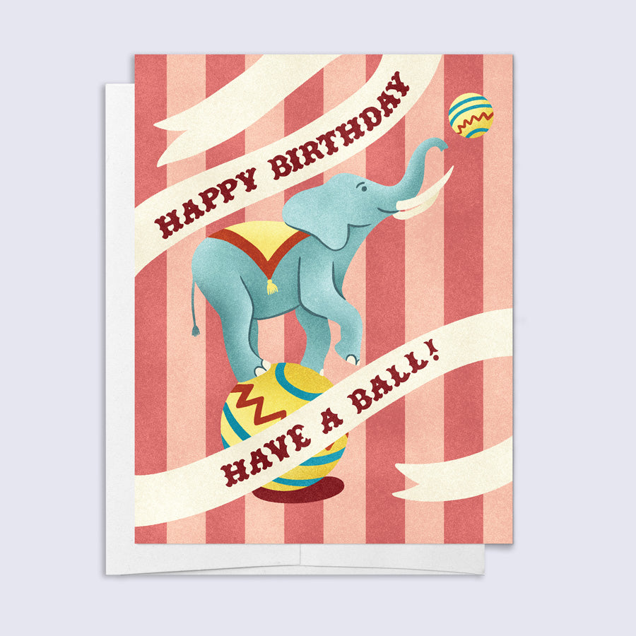 Circus-themed birthday card with an elephant and striped background