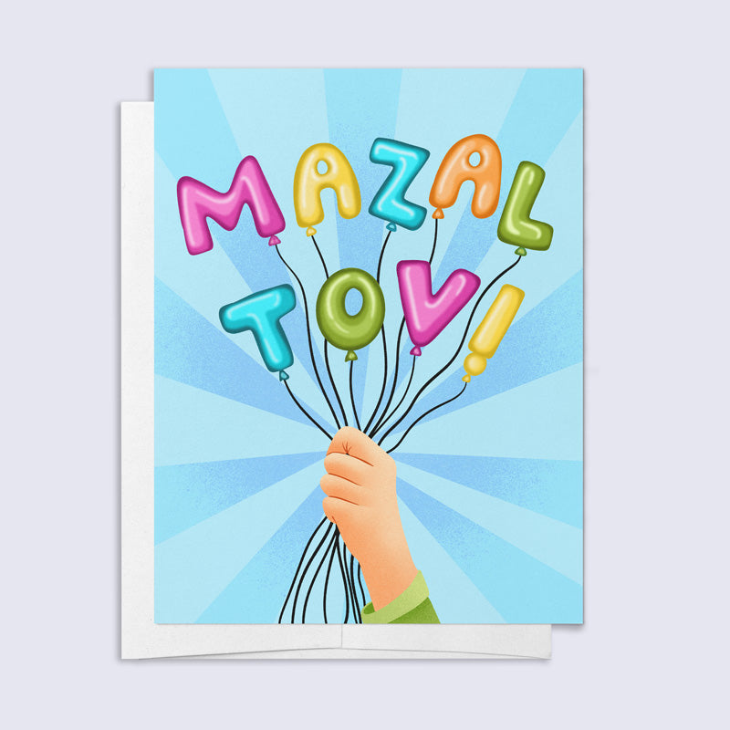 Greeting card with colorful balloons spelling 'Mazel Tov' against a blue background
