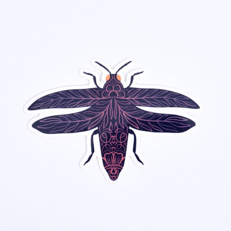 A sticker of a purple open-winged beetle with a floral and garden-themed design.