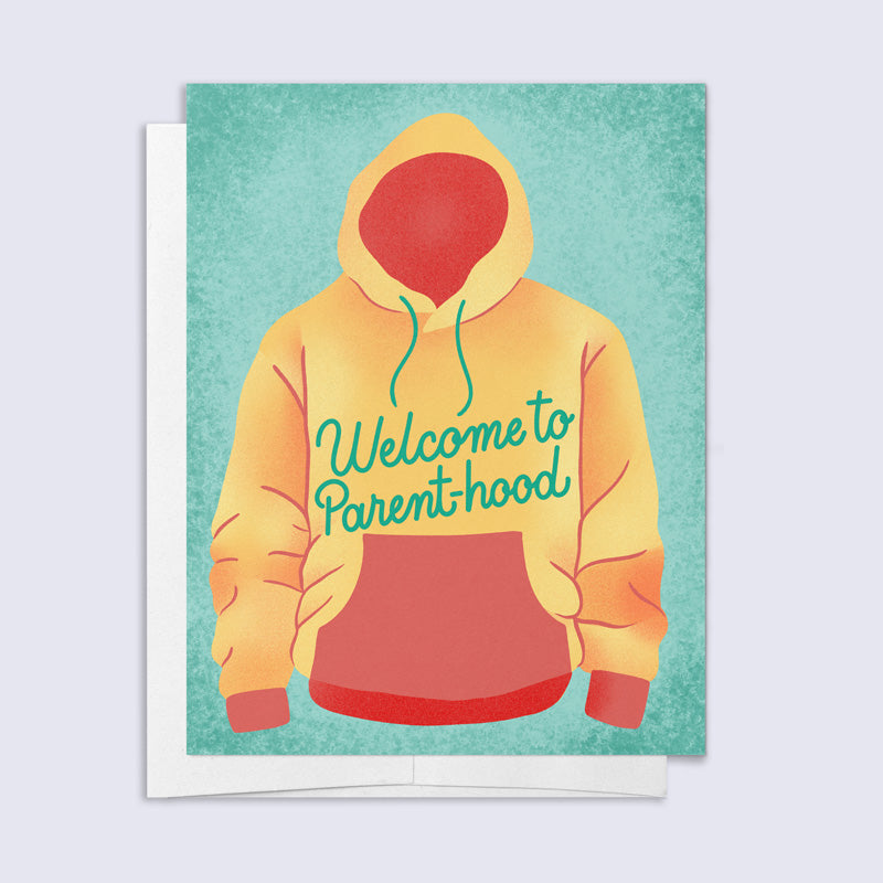 Greeting card with a yellow hoodie and 'Welcome to Parenthood' text on a teal background