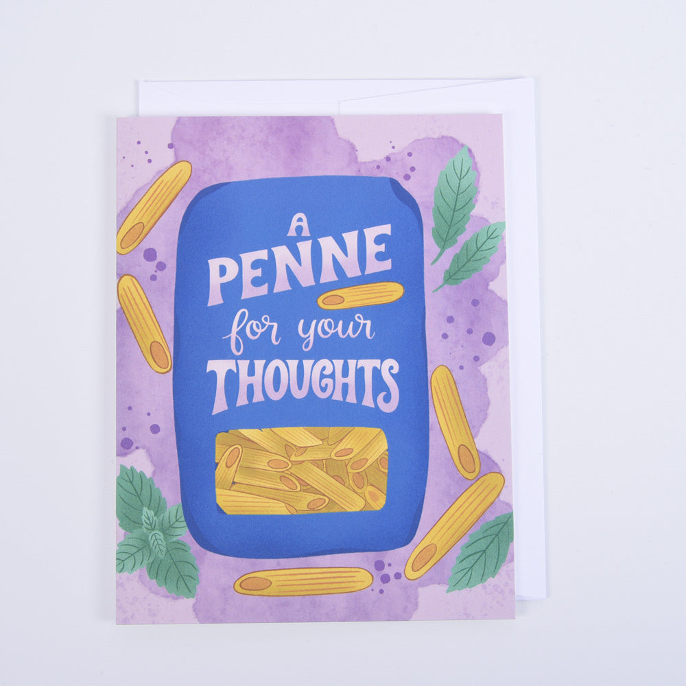 A folded greeting card with a colorful illustration of a package of pasta with penne noodles and basil leaves, and the text 'A Penne for Your Thoughts' along with a bright white envelope