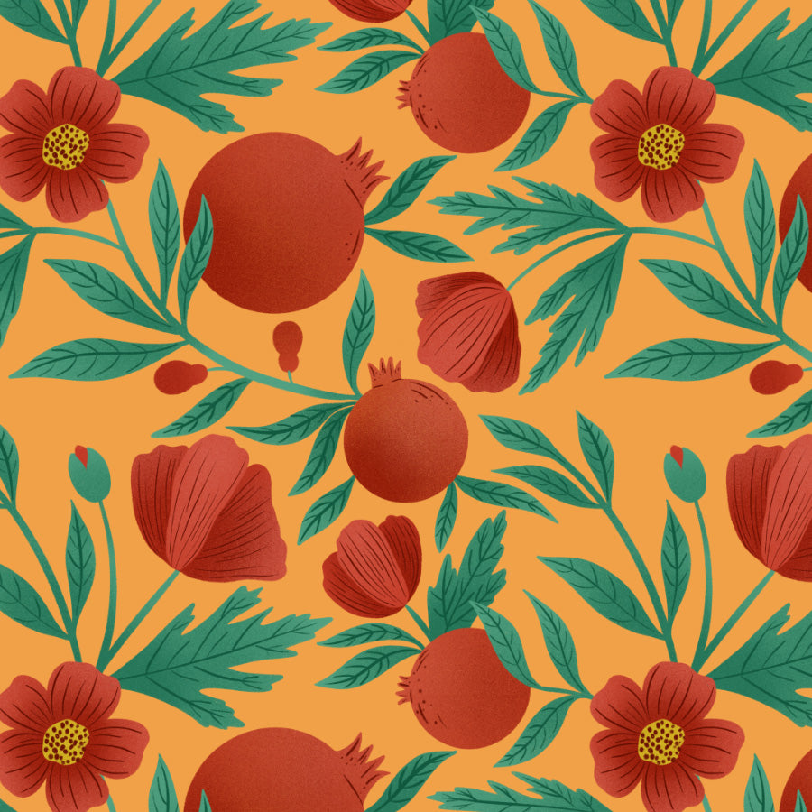 Pattern of pomegranates and red flowers with green leaves on a yellow background