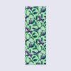 bookmark with illustrated pterodactyls flying amid Jurassic plants