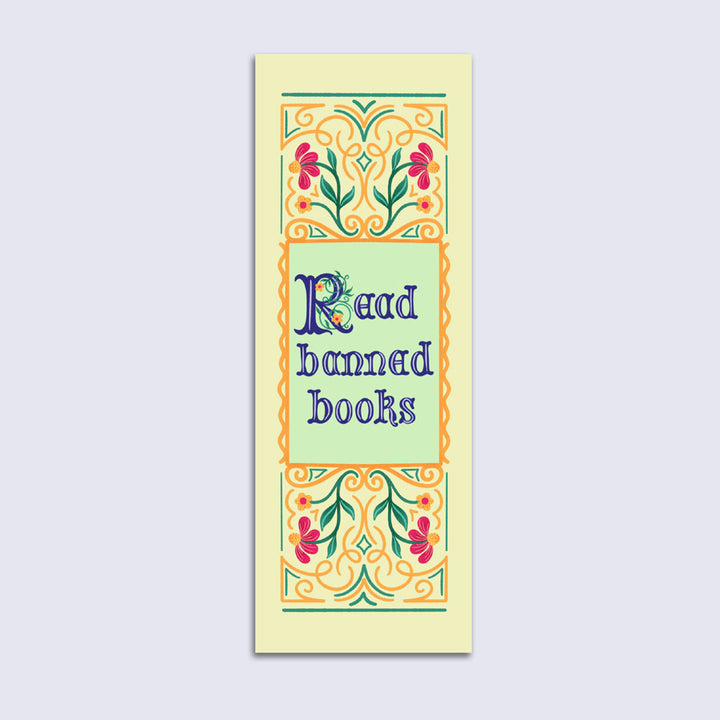bookmark with floral border that says "read banned books"