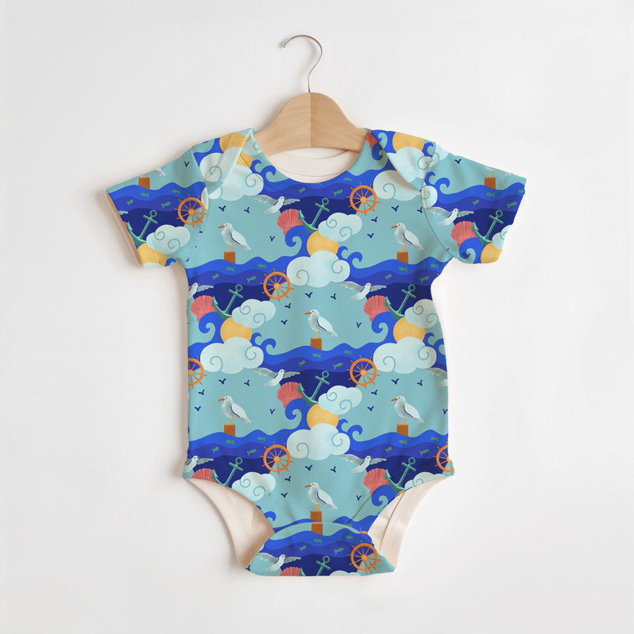 baby onesie featuring colorful pattern with seagulls and waves