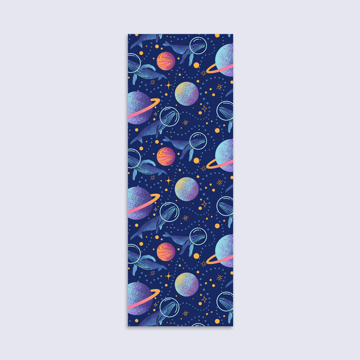 bookmark with illustrated whales exploring planets and stars in space