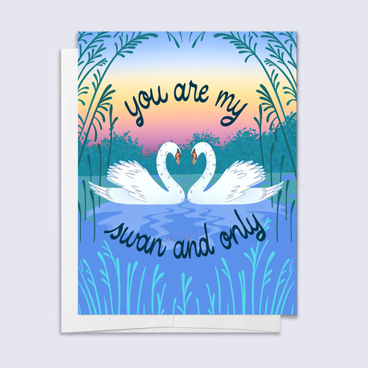 greeting card with illustrated swans whose necks make a heart and text "you are my swan and only"