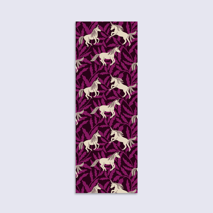 dark purple bookmark with purple vining leaves and cream unicorns