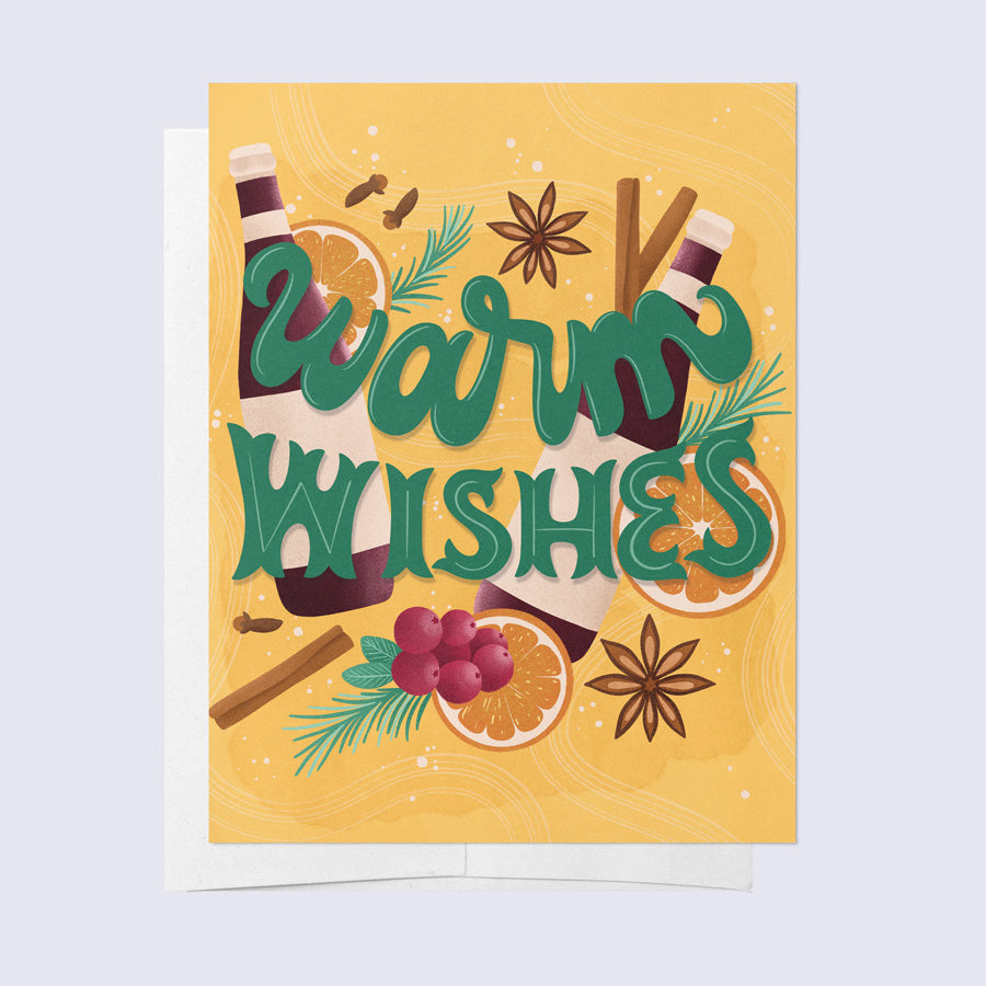 A greeting card with a yellow background featuring text 'Warm Wishes', along with illustrations of a glass of a spiced drink, fruits, and cinnamon sticks.