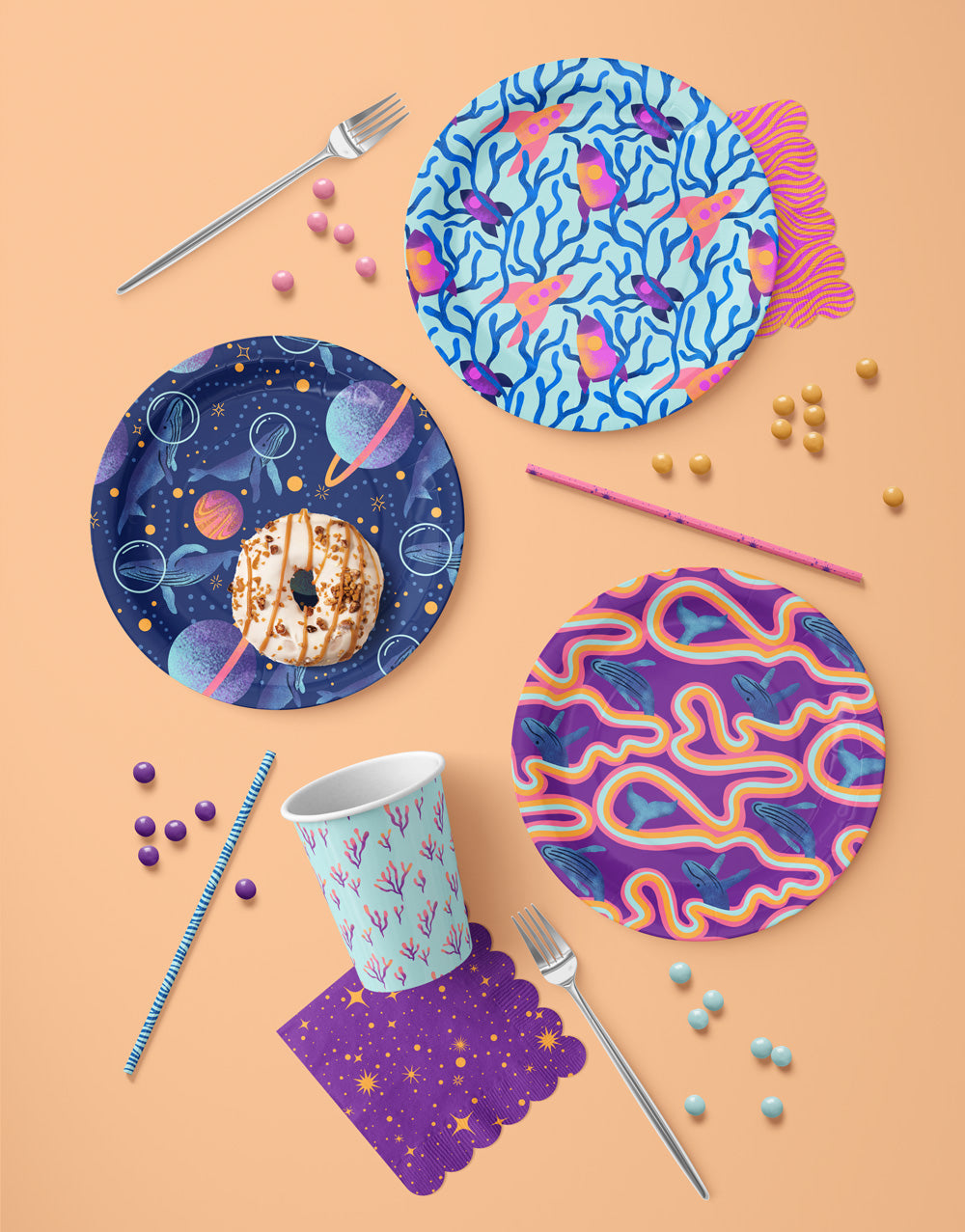 Colorful party plates with unique designs on a beige background